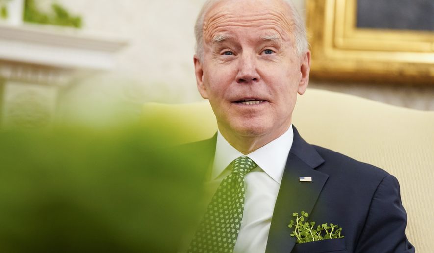 President Joe Biden speaks during a virtual meeting with Ireland&#39;s Prime Minister Micheal Martin on St. Patrick&#39;s Day, in the Oval Office of the White House, Wednesday, March 17, 2021, in Washington. (AP Photo/Andrew Harnik)