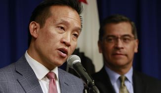 FILE - In this Feb. 13, 2018, file photo, Assemblyman David Chiu, D-San Francisco, left, speaks at a news conference in Sacramento, Calif. Chiu called on Gov. Gavin Newsom to appoint a member of the Asian and Pacific Islander community as California&#39;s next attorney general during a news conference on Wednesday, March 17, 2021. (AP Photo/Rich Pedroncelli, File)