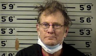 This Tuesday,  March 16, 2021 booking photo provided by the Transylvania County (North Carolina) Detention Center shows Terry Lee Barham. Police said Barham was arrested days after explosive devices were detonated near a county building and a veterans post, causing “superficial damage.” Authorities say officers searched Barham&#39;s residence and found material used to make devices such as those found on Sunday, March 14 at three locations. An unexploded device had also been found near a local Baptist church while worshipers were inside last weekend. (Transylvania County Detention Center via AP)