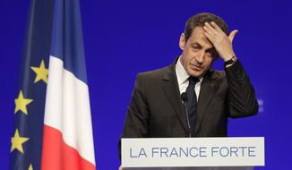 In this April 28, 2012, file photo, France&#39;s President and candidate for reelection in 2012, Nicolas Sarkozy, gestures as he delivers a speech during a campaign meeting in Cournon-d&#39;Auvergne, central France. Former President Sarkozy is scheduled to go on trial Wednesday, March 17, on charges that his unsuccessful reelection bid in 2012 was illegally financed.(AP Photo/Michel Euler, File)