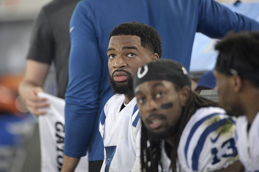 FILE - Indianapolis Colts quarterback Jacoby Brissett (7) and wide receiver T.Y. Hilton (13) watch from the bench during the second half of an NFL football game against the Jacksonville Jaguars in Jacksonville, Fla., in this Sunday, Dec. 29, 2019, file photo.By joining the Dolphins, Brissett embraced a No. 2 role behind Tua Tagovailoa, who is being groomed as a potential franchise quarterback — unless Houston&#39;s Deshaun Watson goes on the trade block, and Miami pursues him.Either way, Brissett will likely be on the bench at age 28. (AP Photo/Phelan M. Ebenhack, File)