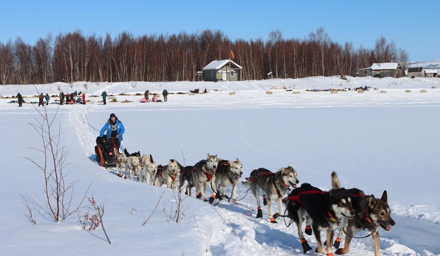 Dallas Seavey sets out from the checkpoint in Iditarod on Thursday afternoon, March 11, 2021, during the Iditarod Trail Sled Dog Race. (Zachariah Hughes/Anchorage Daily News via AP, Pool)