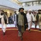 Taliban co-founder Mullah Abdul Ghani Baradar, center, arrives with other members of the Taliban delegation for an international peace conference in Moscow, Russia, Thursday, March 18, 2021. Russia is hosting a peace conference for Afghanistan, bringing together government representatives and their Taliban adversaries along with regional observers in a bid to help jump-start the country&#39;s stalled peace process. The one-day gathering Thursday is the first of three planned international conferences ahead of a May 1 deadline for the final withdrawal of U.S. and NATO troops from the country, a date fixed under a year-old agreement between the Trump administration and the Taliban. (AP Photo/Alexander Zemlianichenko, Pool) **FILE**