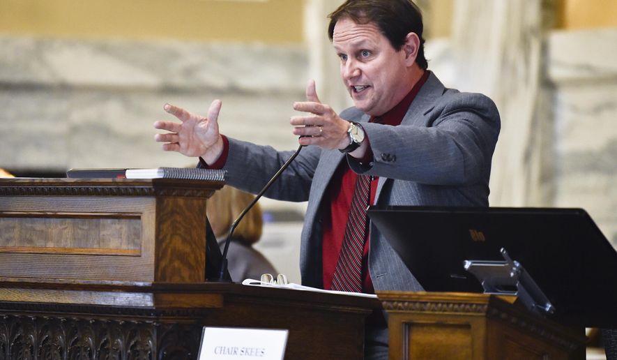 FILE - In this Dec. 7, 2020, file photo, state Rep. Derek Skees speaks during a meeting on the House floor of the Montana State Capitol, in Helena, Mont. Montana lawmakers have revived a controversial dress code that drew accusations of sexism when it was first introduced ahead of the 2015 legislative session before being tabled without ever taking effect. "We've been down this road before," said Rep. Skees, Republican chair of the rules committee. "When we went down this road it turned into an argument and a discussion that really had nothing to do with what we wanted." (Thom Bridge/Independent Record via AP, File)