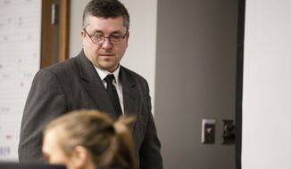 FILE- In this March 14, 2019, Jason Carter stands prior to testimony during the first-degree murder trial against Jason Carter,  accused of killing his mother Shirley Carter in 2015. Carter was acquitted in that trial. In a 2017 trial, Carter was found civilly liable for his mother&#39;s death and ordered to pay $10 million. The Iowa Supreme Court on Friday, March 19, 2021, upheld that civil lawsuit, rejecting his appeal and leaving in place the jury&#39;s $10 million verdict. (Kyle Ocker/The Ottumwa Courier via AP)