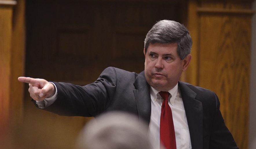 FILE - In this March 16, 2014 file photo, Solicitor Barry Barnette points out Ricky Lee Blackwell, Sr. during closing arguments in the sentencing phase of Blackwell's trial at the Spartanburg County Courthouse in Spartanburg, S.C. South Carolina’s attorney general has sent four unresolved Statehouse corruption cases to a Republican prosecutor in Spartanburg County to handle. (Tim Kimzey/Spartanburg Herald-Journal via AP)