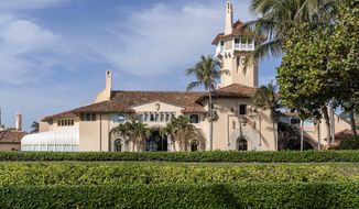 FILE - In this Jan. 18, 2021, file photo, Mar-a-Lago in Palm Beach, Fla. Former President Donald Trump’s Palm Beach club has been partially closed because of a COVID outbreak. That’s according to several people familiar with the situation, including a club member who received a phone call informing them of the closure Friday. A receptionist at Mar-a-Lago club confirmed the news, saying that the club was closed until further notice, but declined to comment further.  (Greg Lovett/The Palm Beach Post via AP)