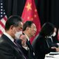 Chinese Communist Party foreign affairs chief Yang Jiechi, center, and China&#39;s State Councilor Wang Yi, second from left, speak at the opening session of US-China talks at the Captain Cook Hotel in Anchorage, Alaska, Thursday, March 18, 2021. (Frederic J. Brown/Pool via AP)