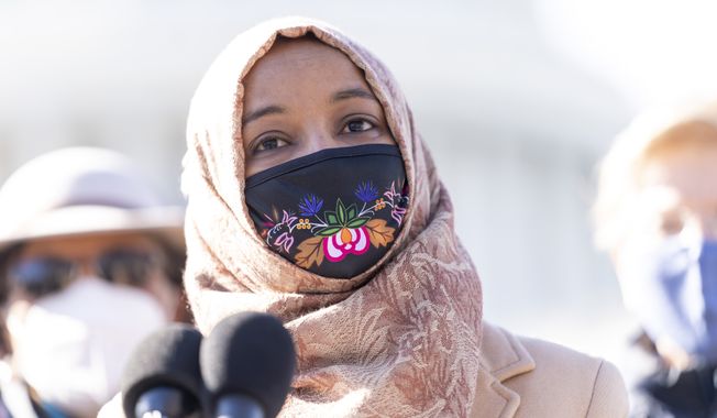 Rep. Ilhan Omar, D-Minn., speaks at a news conference on Capitol Hill in Washington, Feb. 4, 2021. (AP Photo/Andrew Harnik) ** FILE **
