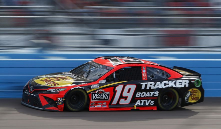 Martin Truex Jr races through Turn 4 during a NASCAR Cup Series auto race at Phoenix Raceway, Sunday, March 14, 2021, in Avondale, Ariz. (AP Photo/Ralph Freso)