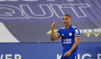 Leicester&#39;s Youri Tielemans celebrates after scoring his side&#39;s second goal during the English FA Cup quarter final soccer match between Leicester City and Manchester United at the King Power Stadium in Leicester, England, Sunday, March 21, 2021. (AP Photo/Ian Walton, Pool)