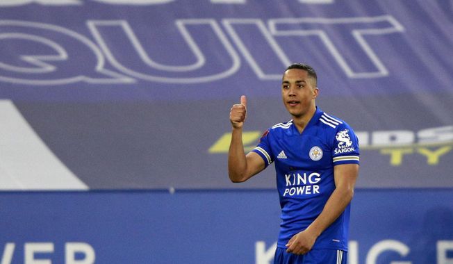 Leicester&#x27;s Youri Tielemans celebrates after scoring his side&#x27;s second goal during the English FA Cup quarter final soccer match between Leicester City and Manchester United at the King Power Stadium in Leicester, England, Sunday, March 21, 2021. (AP Photo/Ian Walton, Pool)