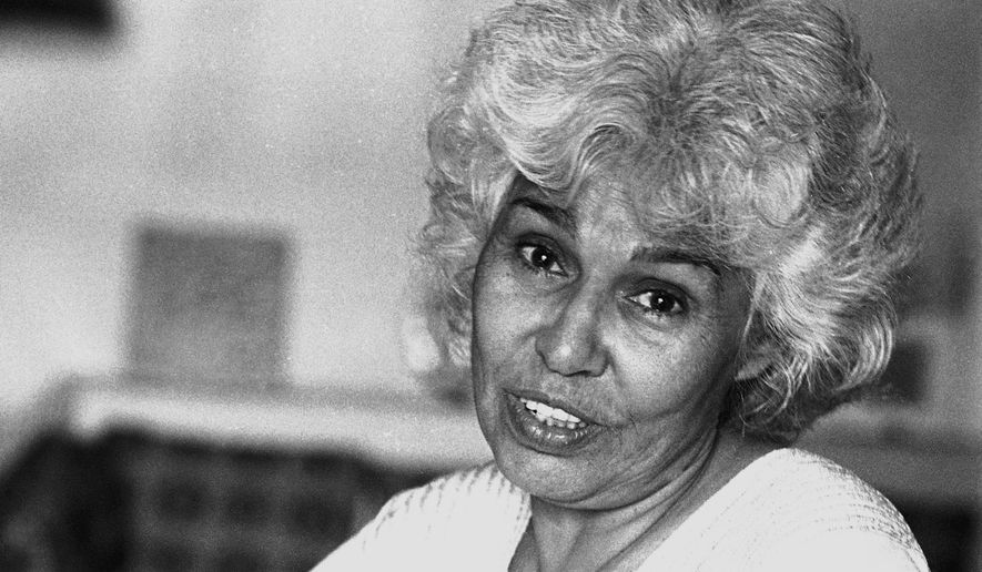 FILE - This July 2, 1985 file photo, shows prominent Egyptian feminist Nawal Saadawi who has been jailed several times for her leftist political views. Saadawi, a renowned Egyptian feminist, psychiatrist and novelist, whose writings have stirred controversy for decades in an overwhelming conservative society, died of age-related health problems in Cairo on Sunday, March 21, 2021, officials said. She was 89. (AP Photo/Paola Crociani, File)