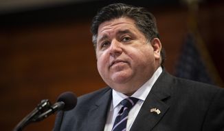 FILE - In this Feb. 22, 2021, file photo, Gov. J.B. Pritzker speaks at Chicago State University in Chicago. Not everyone&#39;s happy with Gov. Pritzker&#39;s budget proposal. But the &amp;quot;pain,&amp;quot; the deep cuts and the across-the-board tax increases which the Democrat predicted would follow last fall&#39;s amendment to generate more income tax revenue, which voters defeated, hasn&#39;t materialized. (Ashlee Rezin Garcia/Chicago Sun-Times via AP, File)