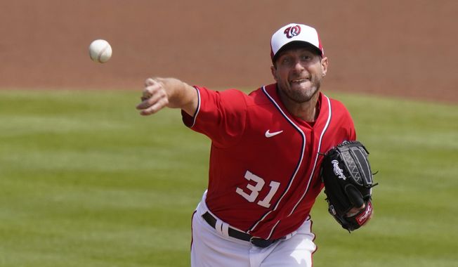 Washington Nationals&#x27; Max Scherzer (31) throws during the first inning of a spring training baseball game against the New York Mets, Sunday, March 21, 2021, in West Palm Beach, Fla. (AP Photo/Lynne Sladky)