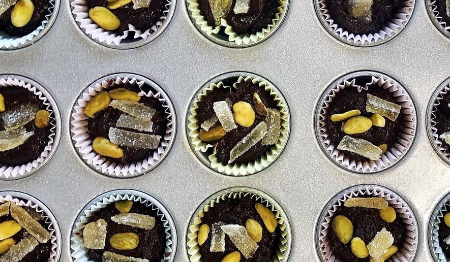 A recipe of chocolate tahini cups, made with 100 percent cacao chocolate chips, is displayed in Alexandria, Va., on Oct. 18, 2020.  There&#39;s more to cacao than chocolate. The cacao fruit and pulp can be used for cooking as well.  (Elizabeth Karmel via AP)