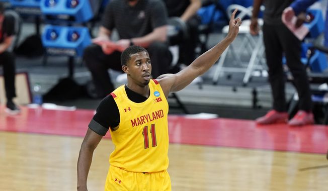 Maryland&#x27;s Darryl Morsell (11) celebrates after scoring against Alabama during the first half of a college basketball game in the second round of the NCAA tournament at Bankers Life Fieldhouse in Indianapolis Monday, March 22, 2021. (AP Photo/Mark Humphrey) **FILE**