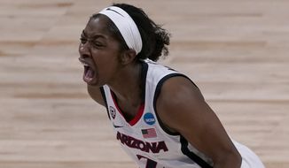 Arizona guard Aari McDonald celebrates after making a basket during the first half of a college basketball game against Stony Brook in the first round of the women&#39;s NCAA tournament at the Alamodome in San Antonio, Monday, March 22, 2021. (AP Photo/Charlie Riedel)