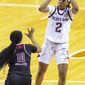 Texas A&amp;amp;M guard Aaliyah Wilson (2) shoots over Troy guard Janiah Sandifer (10) during the second half of a college basketball game in the first round of the women&#39;s NCAA tournament at the Frank Erwin Center in Austin, Texas, Monday, March 22, 2021. (AP Photo/Stephen Spillman)