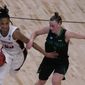 Stanford guard Kiana Williams drives under pressure from Utah Valley guard Maria Carvalho (3) during the second half of a college basketball game in the first round of the women&#39;s NCAA tournament at the Alamodome in San Antonio, Sunday, March 21, 2021. (AP Photo/Charlie Riedel)