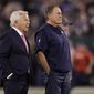 FILE - New England Patriots owner Robert Kraft, left, talks to head coach Bill Belichick as their team warms up before an NFL football game against the New York Jets in East Rutherford, N.J., in this Monday, Oct. 21, 2019, file photo. Belichick never was one to spent wildly in free agency. But after watching Tom Brady celebrate another Super Bowl in another city, Belichick and his boss, Robert Kraft, had seen enough.  (AP Photo/Adam Hunger, File)
