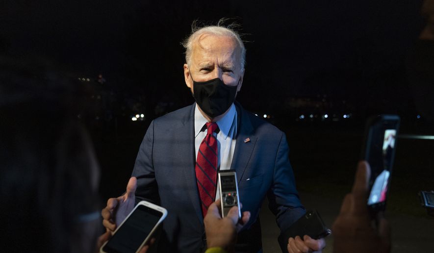 President Joe Biden speaks to members of the press on the South Lawn of the White House in Washington, Tuesday, March 23, 2021, after stepping off Marine One. Biden is returning from Columbus, Ohio. (AP Photo/Patrick Semansky)