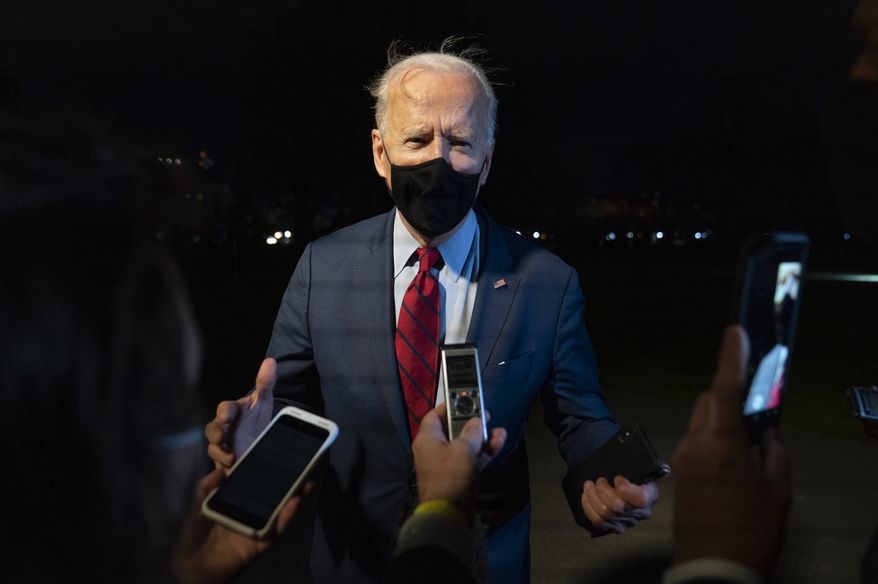 President Joe Biden speaks to members of the press on the South Lawn of the White House in Washington, Tuesday, March 23, 2021, after stepping off Marine One. Biden is returning from Columbus, Ohio. (AP Photo/Patrick Semansky)