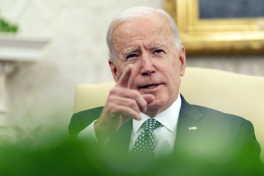 FILE - In this March 17, 2021 photo, President Joe Biden speaks in the Oval Office of the White House in Washington. Biden intends to nominate three African American prosecutors to run the U.S. attorney’s offices in New York, including the first Black man to run the Southern District of New York. That's according to a person familiar with the matter who spoke to The Associated Press on Tuesday. (AP Photo/Andrew Harnik)