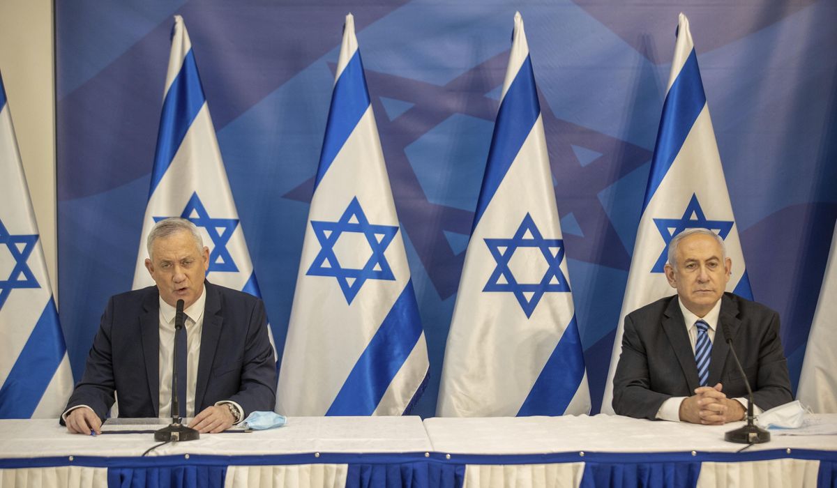 NextImg:Israel forms unity government to prosecute war against Hamas