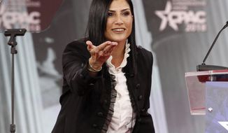 FILE - Dana Loesch, spokesperson for the National Rifle Association, speaks at the Conservative Political Action Conference (CPAC), at National Harbor, Md., on Feb. 22, 2018. Radio America announced Tuesday that it had signed Loesch to a multi-year contract extension. She&#x27;s been doing a show in the same afternoon time slot that Limbaugh occupied since 2014, and is now on about 200 radio stations. (AP Photo/Jacquelyn Martin, File)