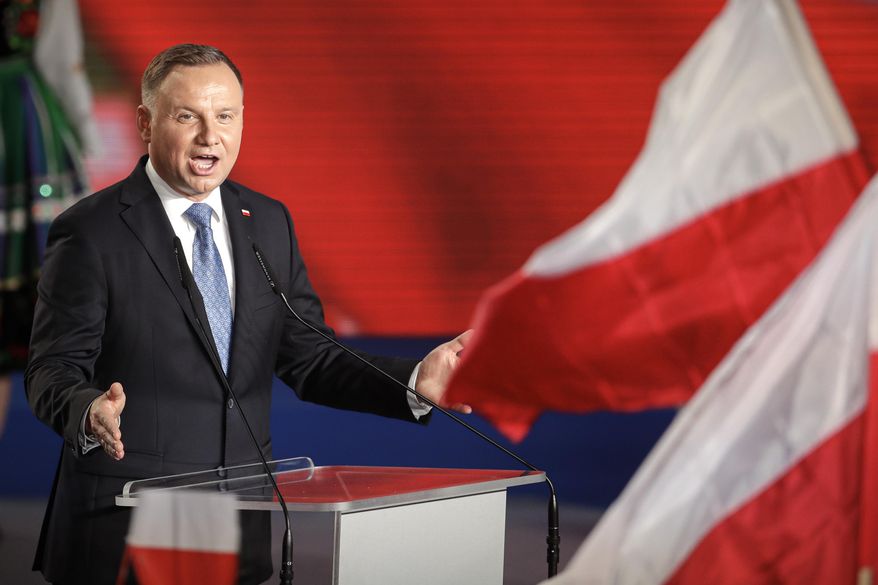 In this Sunday, June 28, 2020 file photo, President Andrzej Duda addressees supporters after voting ended in the presidential election in Lowicz, Poland. A Polish writer is being threatened with up to three years of imprisonment for calling the nation&#39;s president a “moron” on social media. The writer, Jakub Zulczyk,  had criticized the manner in which Polish President Andrzej Duda — a close ally of former President Donald Trump — had reacted to the electoral victory of President Joe Biden last year. (AP Photo/Petr David Josek, File) **FILE**