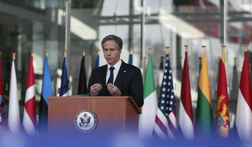 U.S. Secretary of State Antony Blinken delivers an address after a meeting of NATO foreign ministers at NATO headquarters in Brussels on Wednesday, March 24, 2021. (AP Photo/Virginia Mayo, Pool)