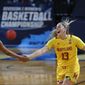 Maryland guard Faith Masonius (13) is congratulated after a basket during the first half of a college basketball game against Alabama in the second round of the women&#39;s NCAA tournament at the Greehey Arena in San Antonio on Wednesday, March 23, 2021. (AP Photo/Ronald Cortes)