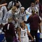 Texas A&amp;amp;M guard Jordan Nixon (5) celebrates with teammates after a college basketball game against Iowa State in the second round of the women&#39;s NCAA tournament at the Alamodome in San Antonio, Wednesday, March 24, 2021. Nixon&#39;s basket at the buzzer gave Texas A&amp;amp;M an 84-82 victory in overtime. (AP Photo/Eric Gay)