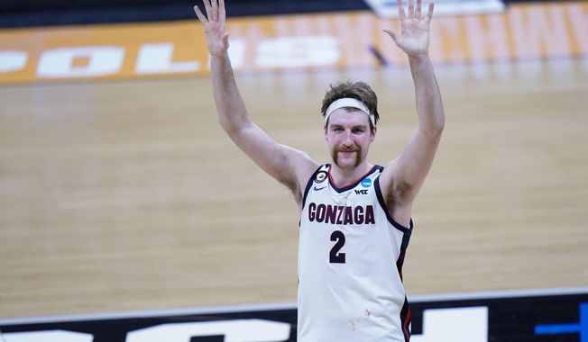 Gonzaga forward Drew Timme (2) reacts to the crowd cheering after defeating Oklahoma in a college basketball game in the second round of the NCAA tournament at Hinkle Fieldhouse in Indianapolis, Monday, March 22, 2021. (AP Photo/AJ Mast)