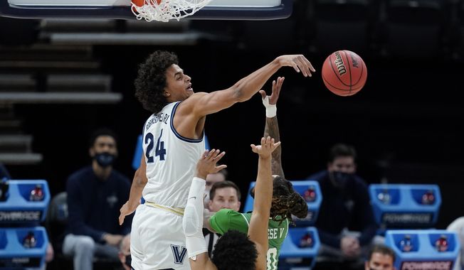 Villanova&#x27;s Jeremiah Robinson-Earl (24) blocks the shot of North Texas&#x27; James Reese (0) during the first half of a second-round game in the NCAA men&#x27;s college basketball tournament at Bankers Life Fieldhouse, Sunday, March 21, 2021, in Indianapolis. There was a notion that Villanova was kind of an afterthought in the NCAA Tournament, even with a five seed and all that experience. It’s hard to think of Villanova as needing a chip on its shoulder, but it&#x27;s got one. They’ll need it against No. 1 Baylor. (AP Photo/Darron Cummings)