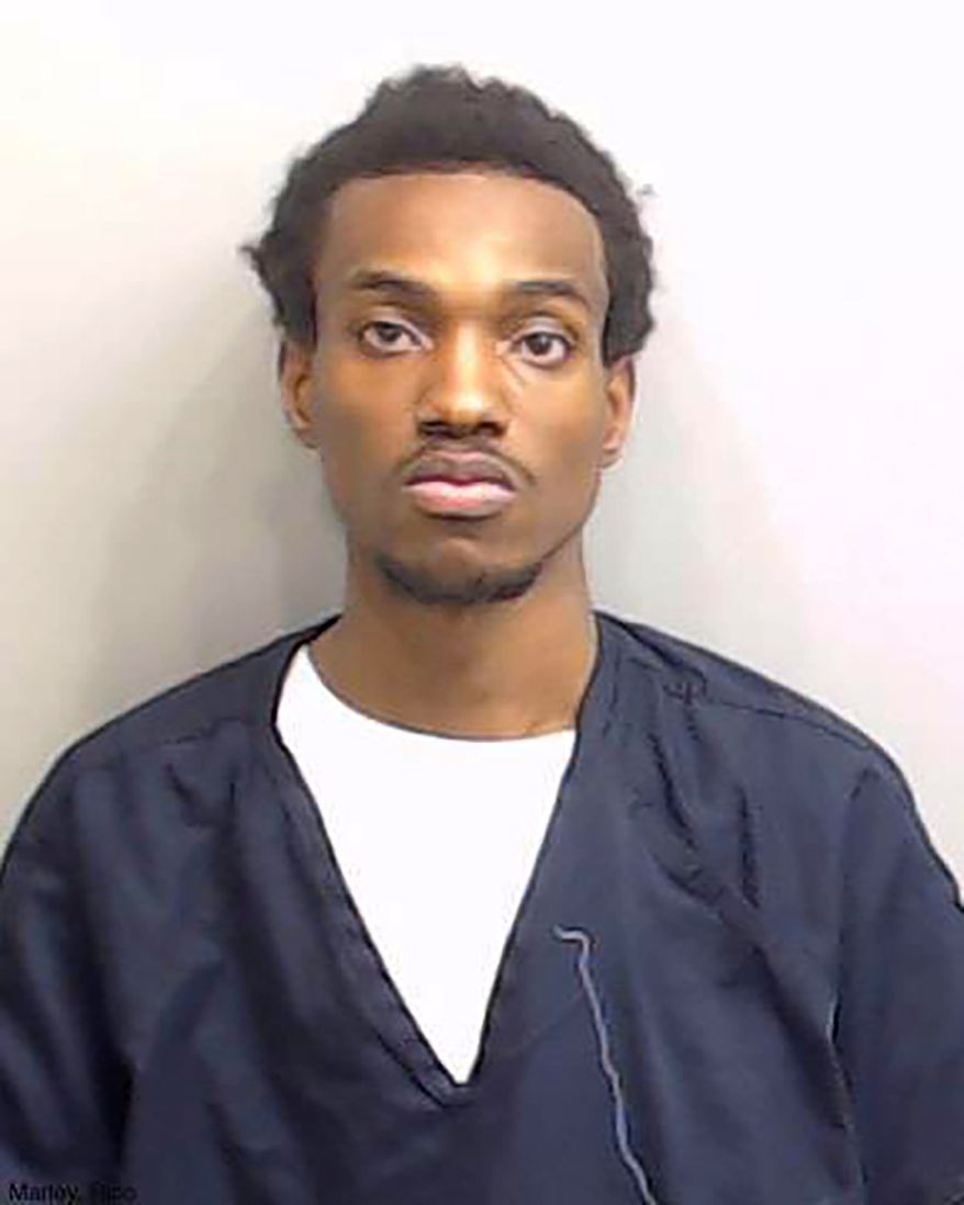 This Wednesday, March 24, 2021, booking photo provided by the Fulton County (Georgia) Sheriff's Office shows Rico Marley. Authorities say police arrested Marley, who walked into an Atlanta grocery store with multiple guns and body armor, just days after the mass shooting at a Colorado supermarket. (Fulton County Sheriff's Office via AP)