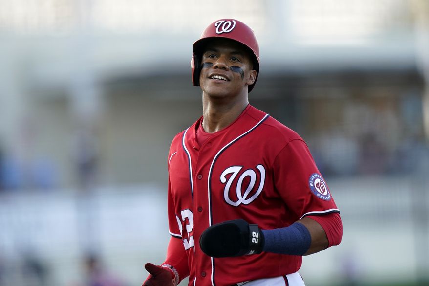 Washington Nationals&#39; Juan Soto goes to the dugout after being thrown out at second during the second inning of a spring training baseball game against the Houston Astros, Wednesday, March 24, 2021, in West Palm Beach, Fl. (AP Photo/Lynne Sladky) **FILE**