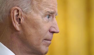 President Joe Biden listens to a question during a news conference in the East Room of the White House, Thursday, March 25, 2021, in Washington. (AP Photo/Evan Vucci)