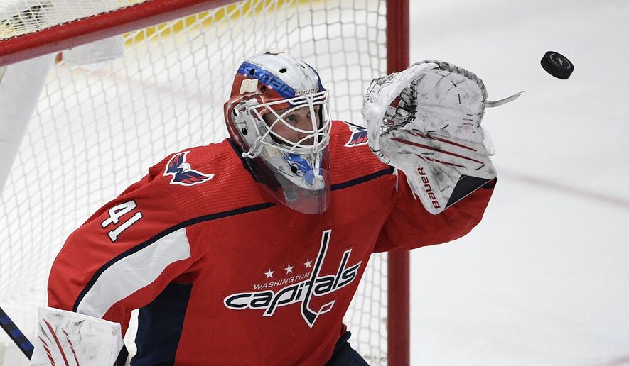 Washington Capitals goaltender Vitek Vanecek prepares to catch the puck during the second period of the team&#39;s NHL hockey game against the New Jersey Devils, Thursday, March 25, 2021, in Washington. (AP Photo/Nick Wass)