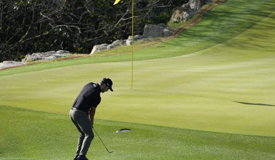Patrick Cantlay hits his third shot on the second hole during a second round match against Carlos Ortiz of Mexico, at the Dell Technologies Match Play Championship golf tournament Thursday, March 25, 2021, in Austin, Texas. (AP Photo/David J. Phillip)