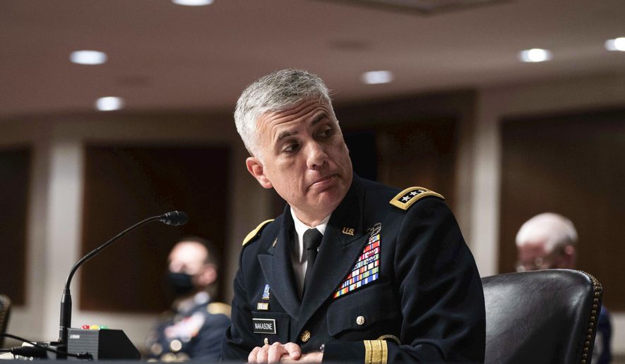 U.S. Cyber Command Commander, National Security Agency Director and Central Security Service Chief Gen. Paul Nakasone listens during a hearing to examine United States Special Operations Command and United States Cyber Command in review of the Defense Authorization Request for fiscal year 2022 and the Future Years Defense Program, on Capitol Hill, Thursday, March 25, 2021, in Washington. (Anna Moneymaker/The New York Times via AP, Pool)
