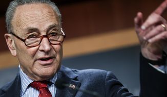 Senate Majority Leader Chuck Schumer of New York holds a news conference Thursday, March 25, 2021, on Capitol Hill in Washington. (Jonathan Ernst/Pool via AP) **FILE**
