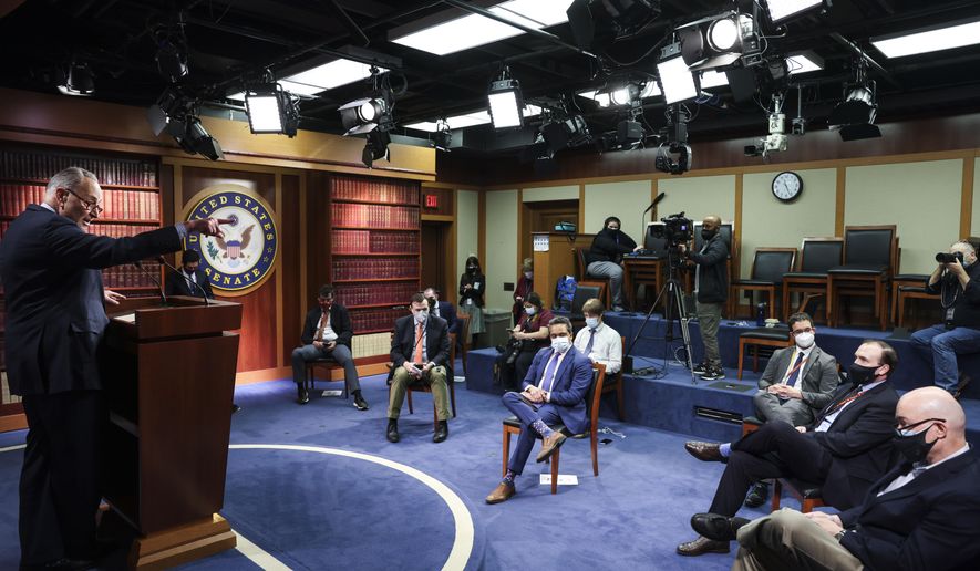 Senate Majority Leader Chuck Schumer of New York, holds a news conference, Thursday, March 25, 2021 on Capitol Hill in Washington. (Jonathan Ernst/Pool via AP)