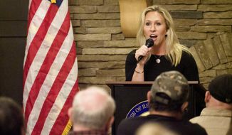 Marjorie Taylor Greene, congresswoman for the 14th District in Georgia, speaks during the Murray County town hall meeting at The Cloer Barn on Wednesday, March 24, 2021, in Chatsworth, Ga. (C.B. Schmelter/Chattanooga Times Free Press via AP) **FILE**