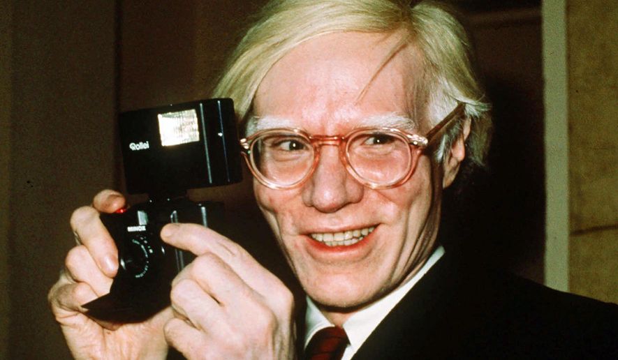 In this 1976 photo, pop artist Andy Warhol smiles in New York. (AP Photo/Richard Drew) **FILE**