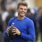 BYU quarterback Zach Wilson warms up before participating in the school&#x27;s pro day football workout for NFL scouts Friday, March 26, 2021, in Provo, Utah. (AP Photo/Rick Bowmer)