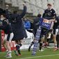 Scotland&#39;s Stuart Hogg, second right, celebrates after Scotland&#39;s Duhan Van der Merwe scored the winning try during the Six Nations rugby union international match between France and Scotland at the Stade de France in Saint-Denis, near Paris, Friday, March 26, 2021. (AP Photo/Christophe Ena)
