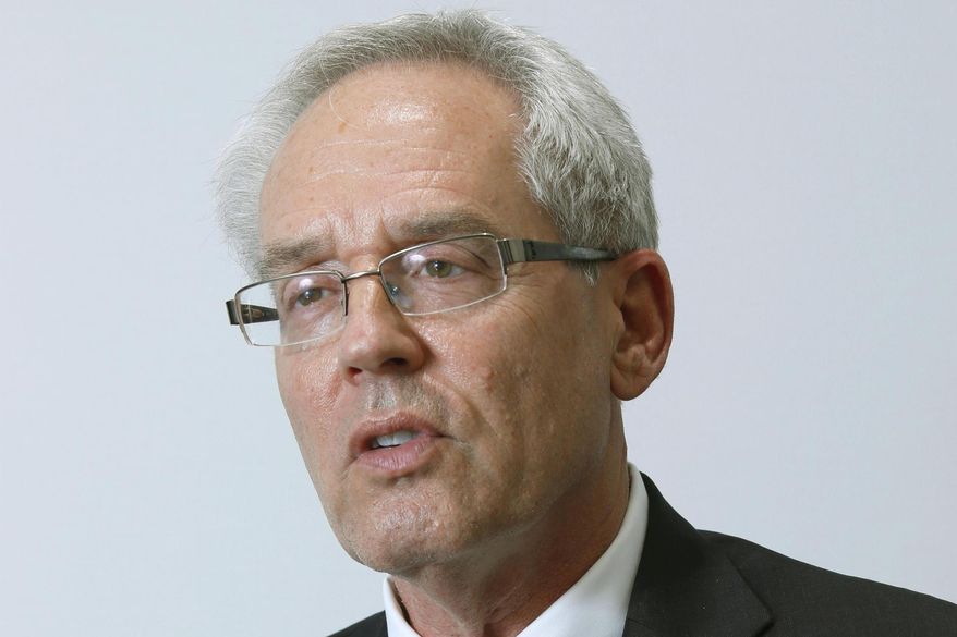 FILE - In this Sept. 8, 2020, file photo, former Nissan Motor Co.&#39;s executive Greg Kelly speaks during an interview in Tokyo. The trial of former Nissan executive Kelly in a Tokyo court is increasingly focusing on a rift between Nissan Motor Co. and its French alliance partner. (Kyodo News via AP, File)