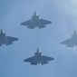U.S. Navy F-35 jets fly over Levi&#39;s Stadium during the national anthem before an NFL divisional playoff football game between the San Francisco 49ers and the Minnesota Vikings, Saturday, Jan. 11, 2020, in Santa Clara, Calif. (AP Photo/Ben Margot) ** FILE **